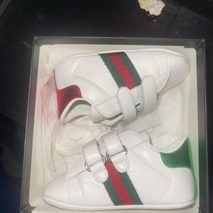 Infant size soft bottom Gucci shoe ( newborn -6 months )